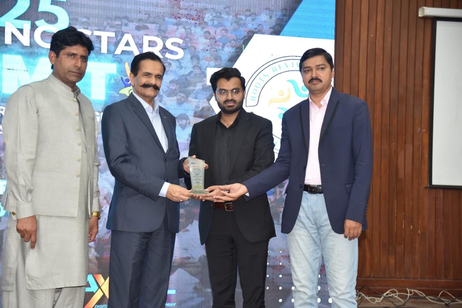 Digital Next representative receives an award at the Digital Next Expo